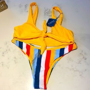 Brand new multicolor bikini. Great for a smaller chest and thicker bottom!!